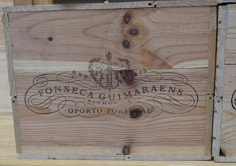 Two sealed wood cases of twelve bottles (twenty-four bottles) of 1992 Fonseca Vintage Port, in OWC's, purchased en primeur from The Wine Society. Condition - good